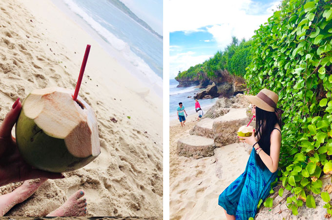 ドリームビーチでココナッツジュースを飲む女性モデル